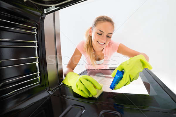 Woman Cleaning Inside The Oven Stock photo © AndreyPopov