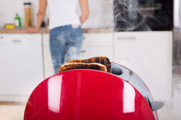 Burnt Toast Coming Out Of Toaster Stock photo © AndreyPopov