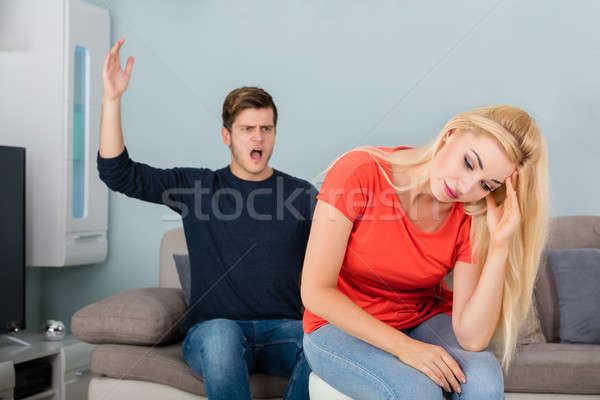 Man Shouting To His Wife At Home Stock photo © AndreyPopov