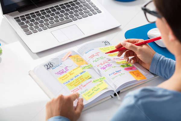 Zakenvrouw schema ontwerper dagboek werkplek Stockfoto © AndreyPopov