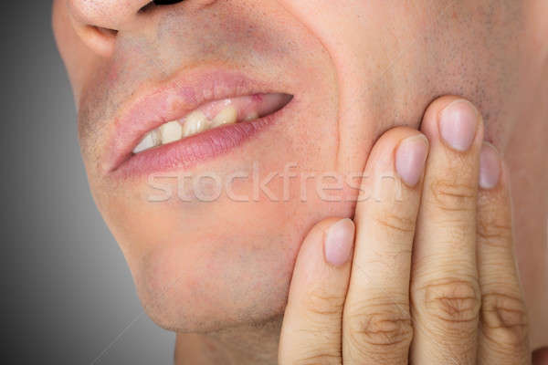 Człowiek cierpienie ból zęba szary twarz Zdjęcia stock © AndreyPopov