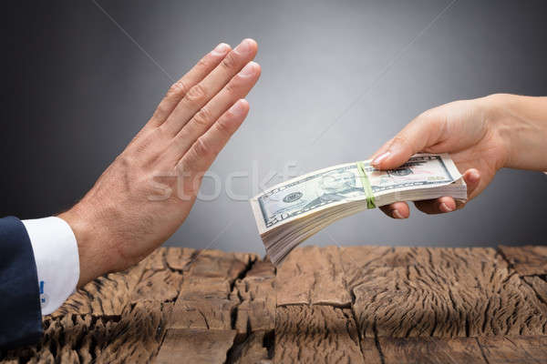 Businessperson Refusing To Take Bribe Stock photo © AndreyPopov