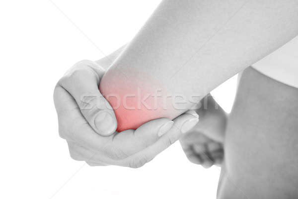 Kobieta łokieć ból odizolowany biały Zdjęcia stock © AndreyPopov