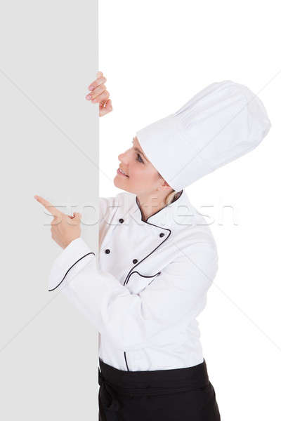 Female Chef Showing Blank Placard Stock photo © AndreyPopov