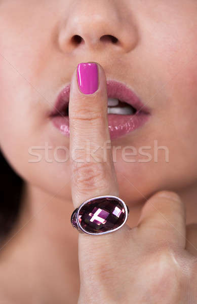 Kobieta palec usta ręce twarz Zdjęcia stock © AndreyPopov