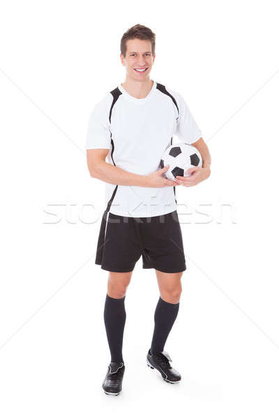 Glücklich männlich Fußballer jungen halten Fußball Stock foto © AndreyPopov