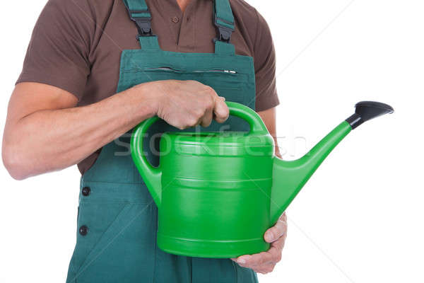 Gardener With Watering Can Stock photo © AndreyPopov