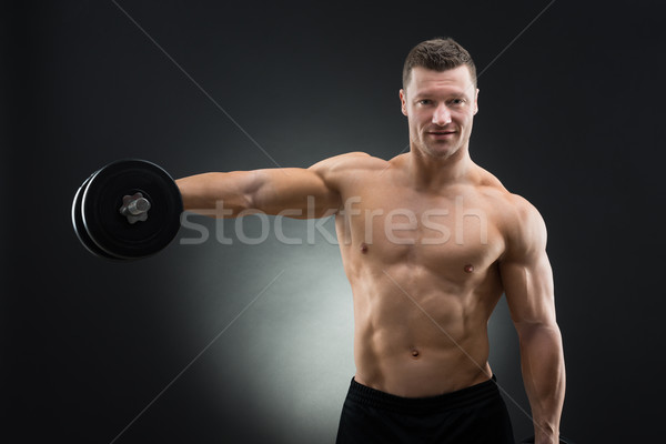 Portret muskularny człowiek stałego Zdjęcia stock © AndreyPopov