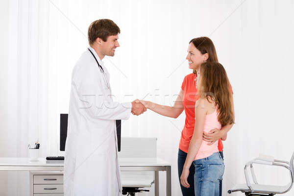 Doctor Handshaking Girl Mother Stock photo © AndreyPopov