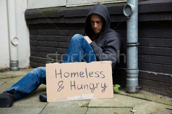 Obdachlosen hungrig Mann Sitzung Straße armen Stock foto © AndreyPopov