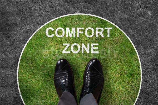 Businessman Standing In Comfort Zone Text Stock photo © AndreyPopov