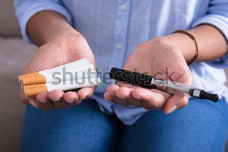 Kobieta elektronicznej papierosów strony Zdjęcia stock © AndreyPopov