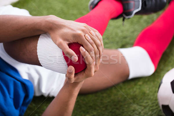 Verletzt Fußballer Bereich männlich Hand Stock foto © AndreyPopov