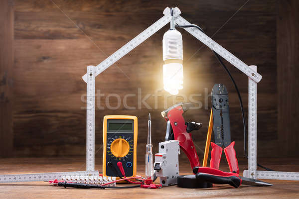 Repair Tools Under The Illuminated House Stock photo © AndreyPopov