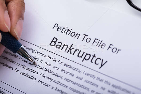 Stock photo: Person Filling Bankruptcy Form