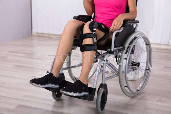 Female Patient Sitting On Wheelchair Stock photo © AndreyPopov