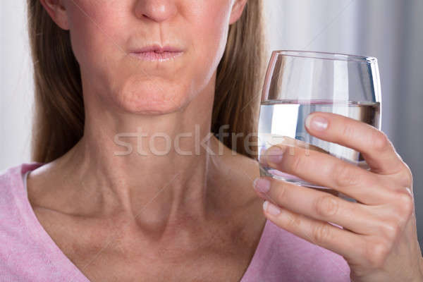 Woman Rinsing And Gargling With Water Stock photo © AndreyPopov