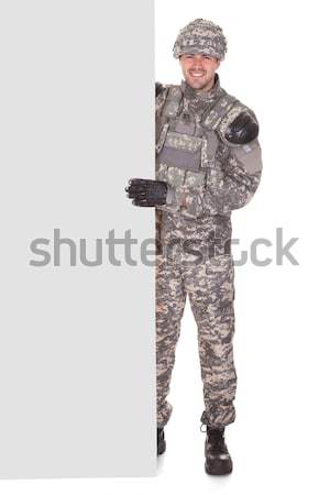 Portrait Of Solider Holding Rifle Stock photo © AndreyPopov