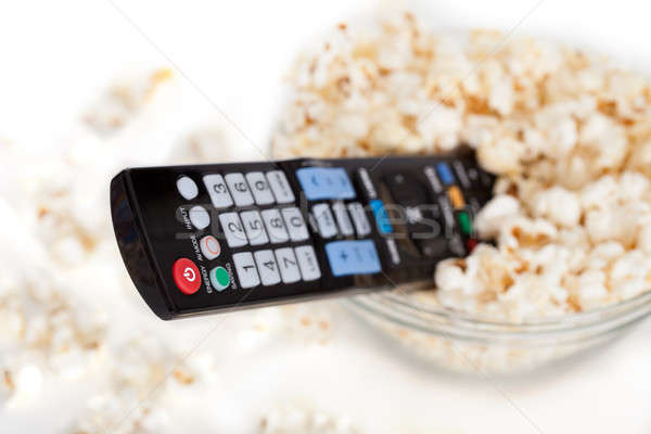 Close-up Of Remote Control In Bowl Of Popcorn Stock photo © AndreyPopov