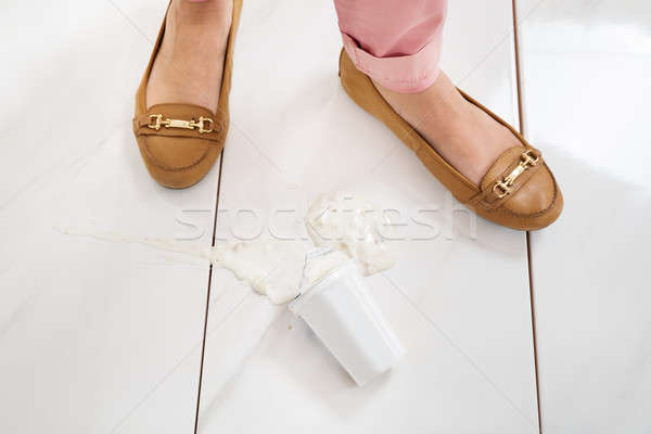 Female Leg With The Spilled Yoghurt Stock photo © AndreyPopov