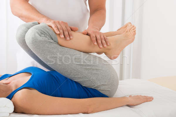 Człowiek masażu kobieta starsza kobieta spa Zdjęcia stock © AndreyPopov