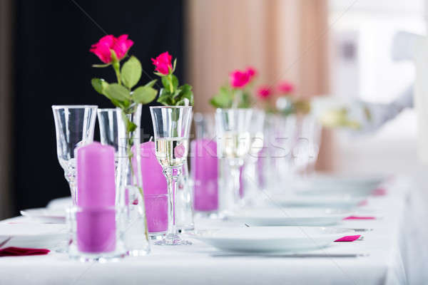 Pincér áramló pezsgő üveg közelkép rózsa Stock fotó © AndreyPopov