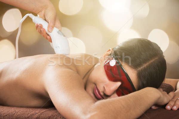 Frau Laser Behandlung Gläser glücklich Stock foto © AndreyPopov