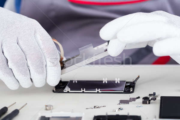 Technician Repairing Mobile Phone Stock photo © AndreyPopov