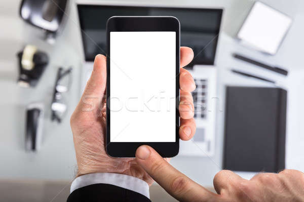 Hand Showing Smart Phone Screen Stock photo © AndreyPopov