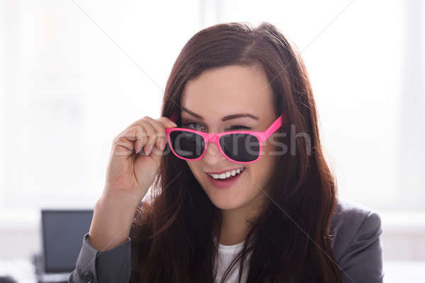 Businesswoman Wearing Pink Sunglasses Stock photo © AndreyPopov