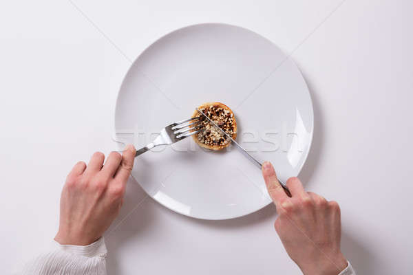 Woman's Hand With Fresh Food On Plate Stock photo © AndreyPopov