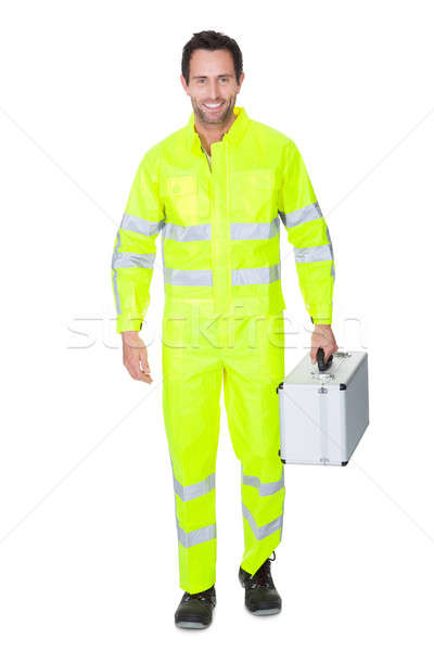 Happy worker wearing safety jacket Stock photo © AndreyPopov