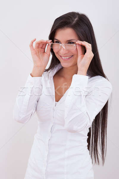 Feliz mujer gafas de lectura manos Foto stock © AndreyPopov
