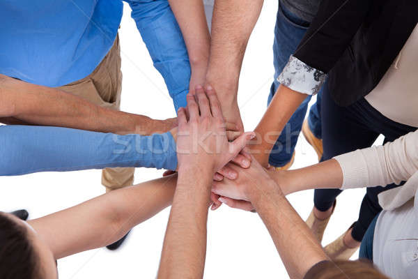 Grupo de personas manos junto aislado blanco mujer Foto stock © AndreyPopov