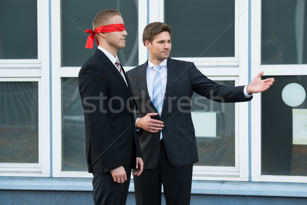 Affaires yeux bandés partenaire jeunes à l'extérieur bureau [[stock_photo]] © AndreyPopov