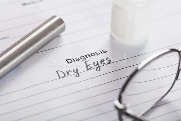 Text Diagnosis Dry Eyes On Paper With Glasses And Medicine Stock photo © AndreyPopov