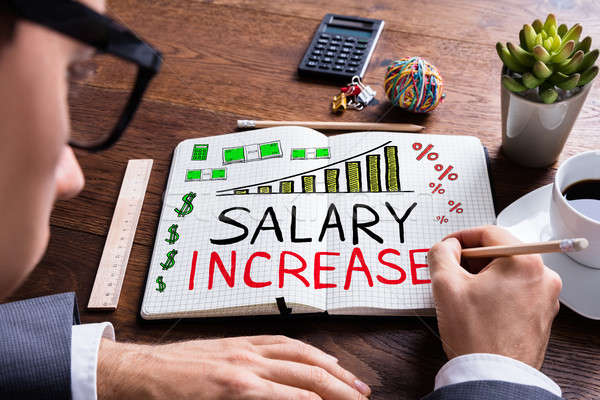 üzletember rajz fizetés növekedés jegyzettömb asztal Stock fotó © AndreyPopov