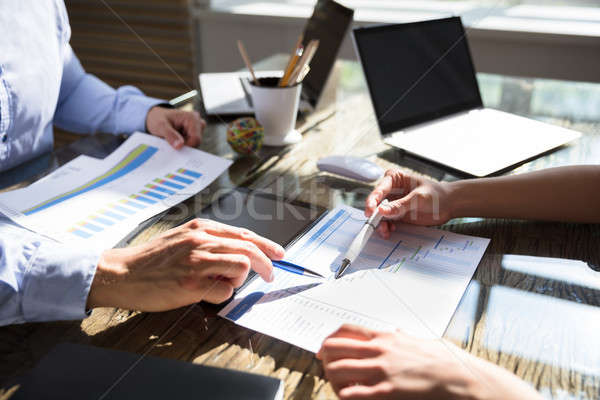 Two Businesspeople Working On Gantt Chart Stock photo © AndreyPopov