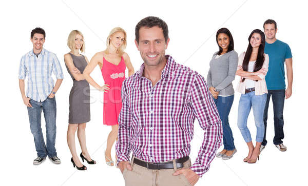 Casual group of people standing over white Stock photo © AndreyPopov