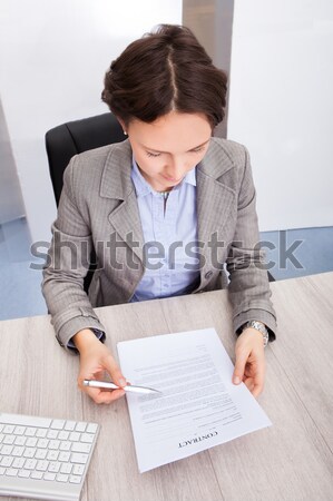 Woman writing in her diary Stock photo © AndreyPopov