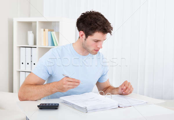 Man Calculating His Bills Stock photo © AndreyPopov