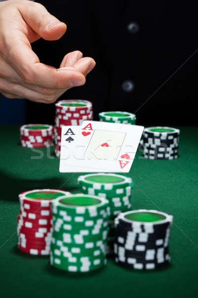 Close-up of human hand with playing cards Stock photo © AndreyPopov