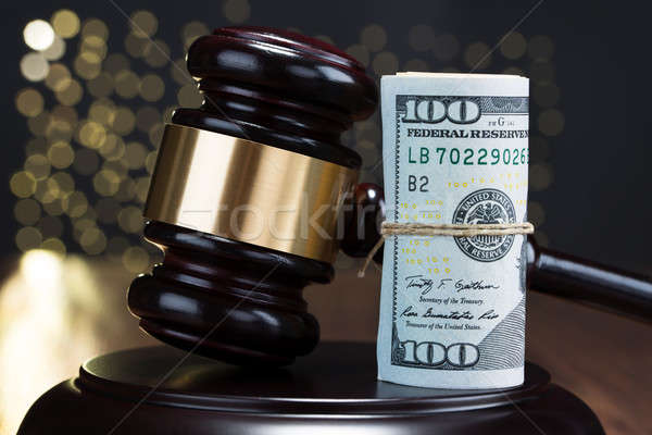Gavel With Rolled Banknote Stock photo © AndreyPopov