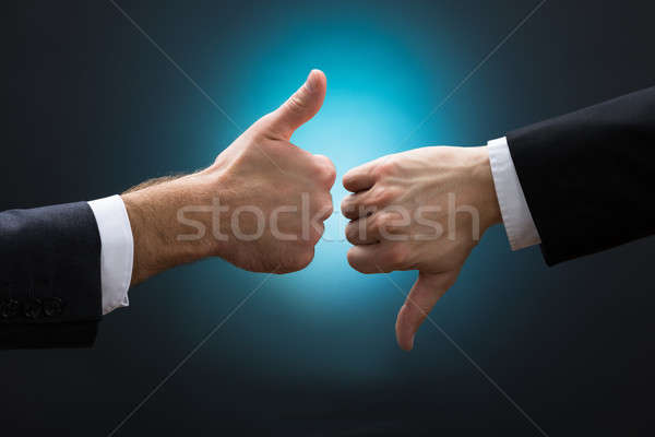 Biznesmenów jak nie lubić znaki ręce Zdjęcia stock © AndreyPopov
