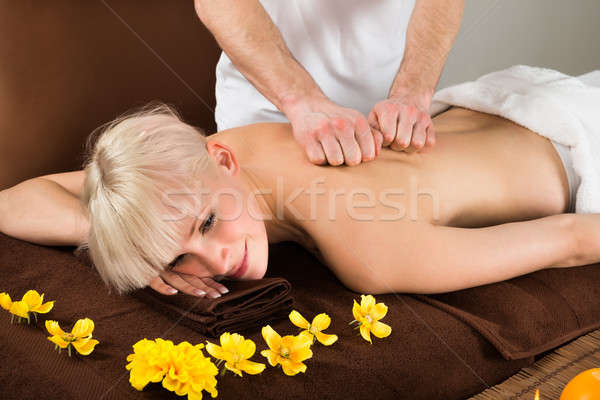 Young Woman Receiving Massage At Spa Stock photo © AndreyPopov