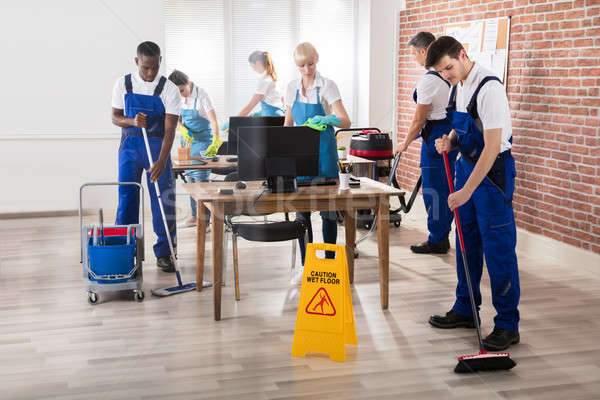 Janitors Cleaning The Office Stock photo © AndreyPopov