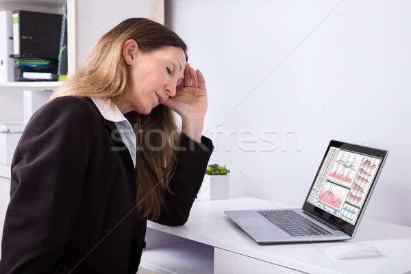 Stock photo: Side View Of A Tired Businesswoman