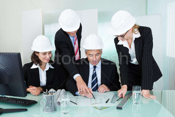 Stock photo: Meeting of architects or structural engineers