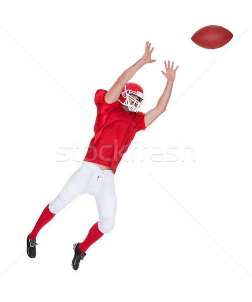 American Football player catching ball Stock photo © AndreyPopov