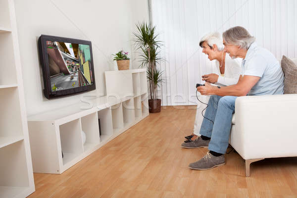 Couple jouer ordinateur jeux excité [[stock_photo]] © AndreyPopov